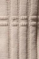 Suéter con patrones de rombos