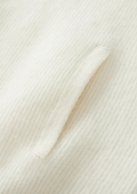 Cárdigan de lana con punto canalé y cremallera frontal