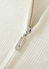 Cárdigan de lana con punto canalé y cremallera frontal