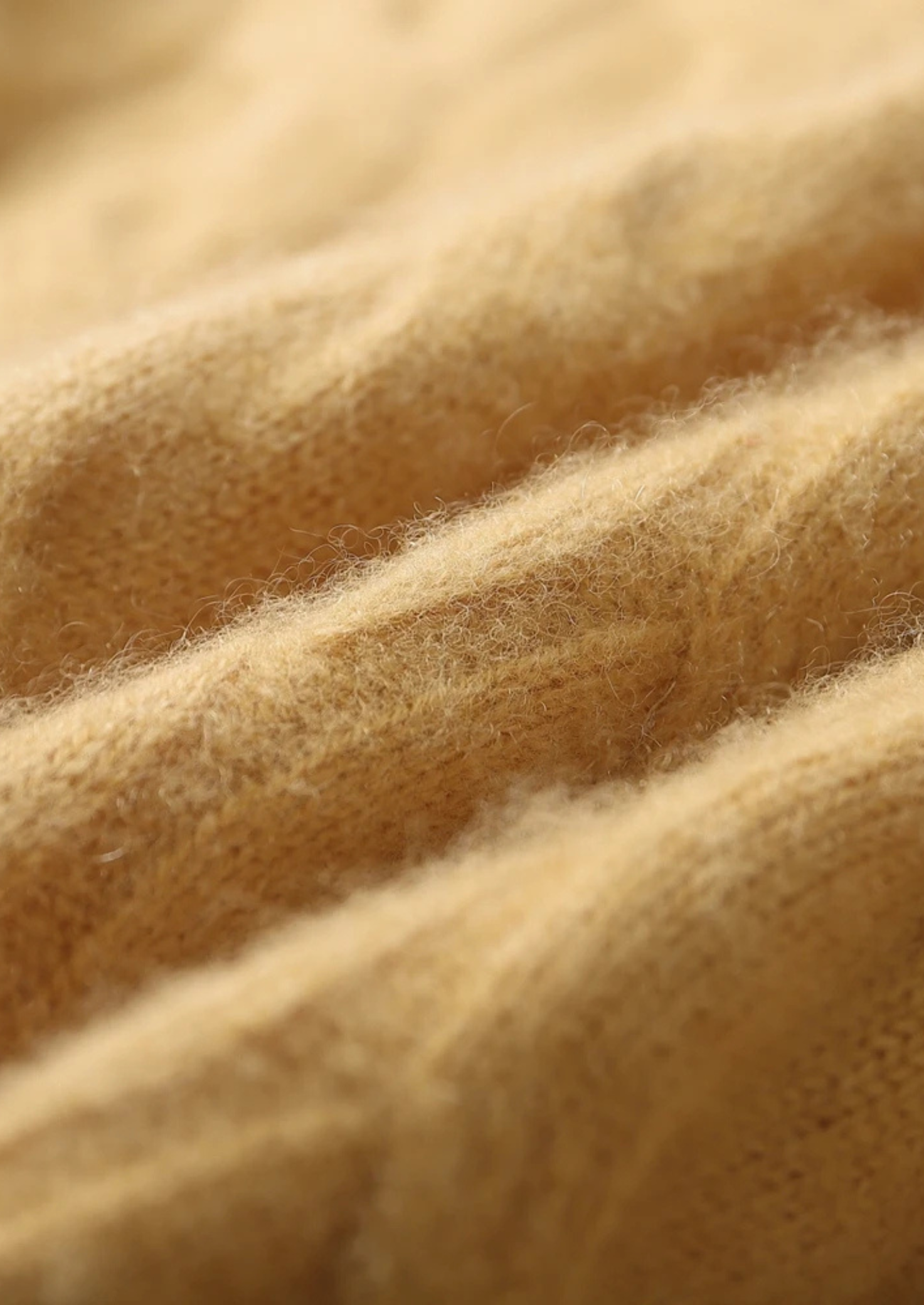 Suéter de lana con punto cable y cuello redondo