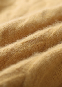 Suéter de lana con punto cable y cuello redondo