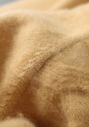 Suéter de lana con punto cable y cuello redondo