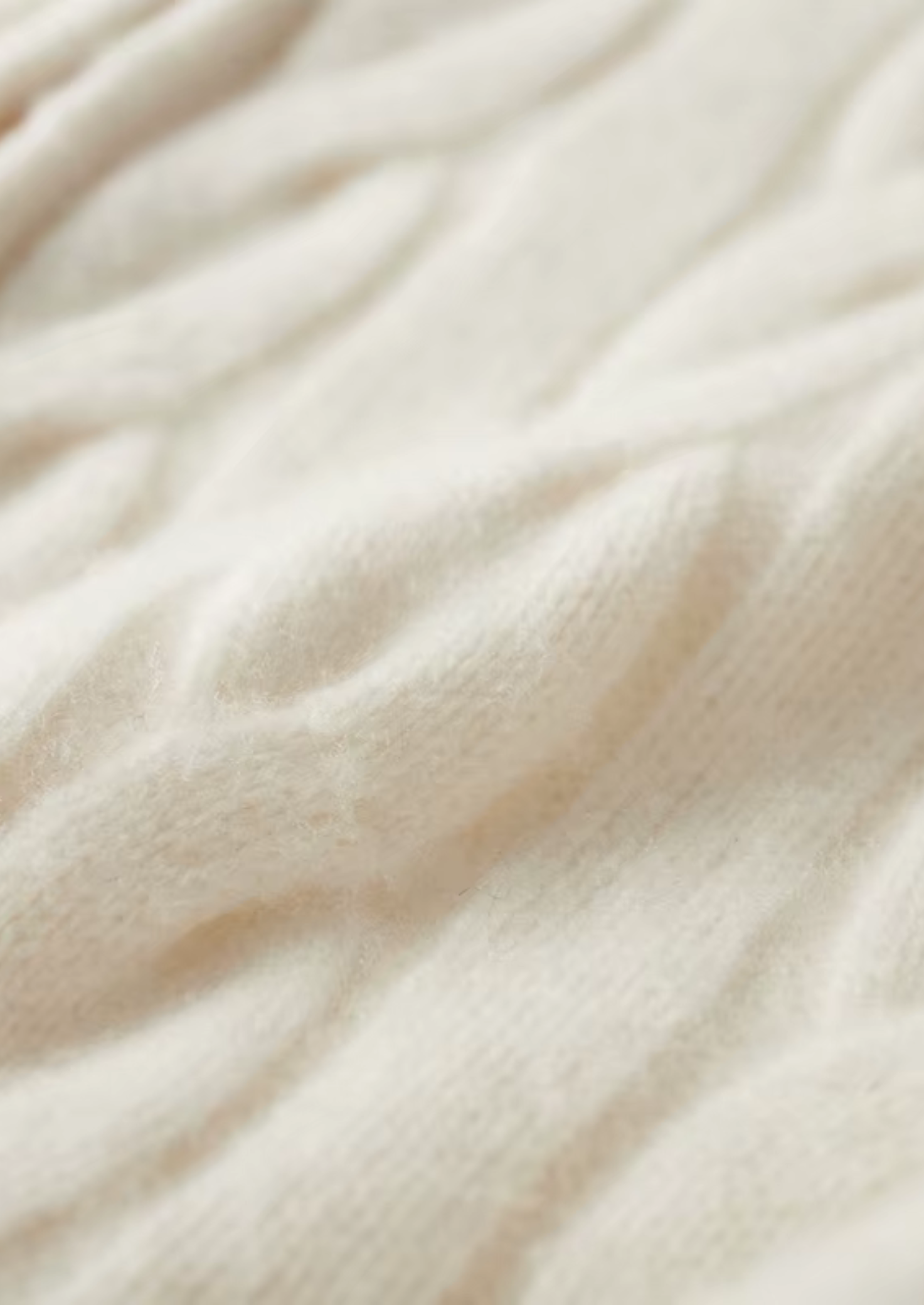 Cárdigan de lana con doble cremallera y punto cable