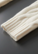 Cárdigan de lana con doble cremallera y punto cable