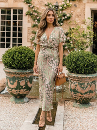 Corail | Robe midi à imprimé abstrait, décolleté en V et taille nouée