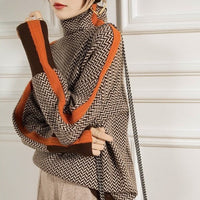 Malú | Jersey de cuello alto con rayas en contraste